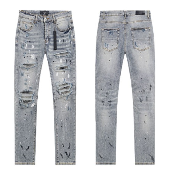 Light Blue Washed Denim Jeans with Paint Splatter and Multi-Rip Details